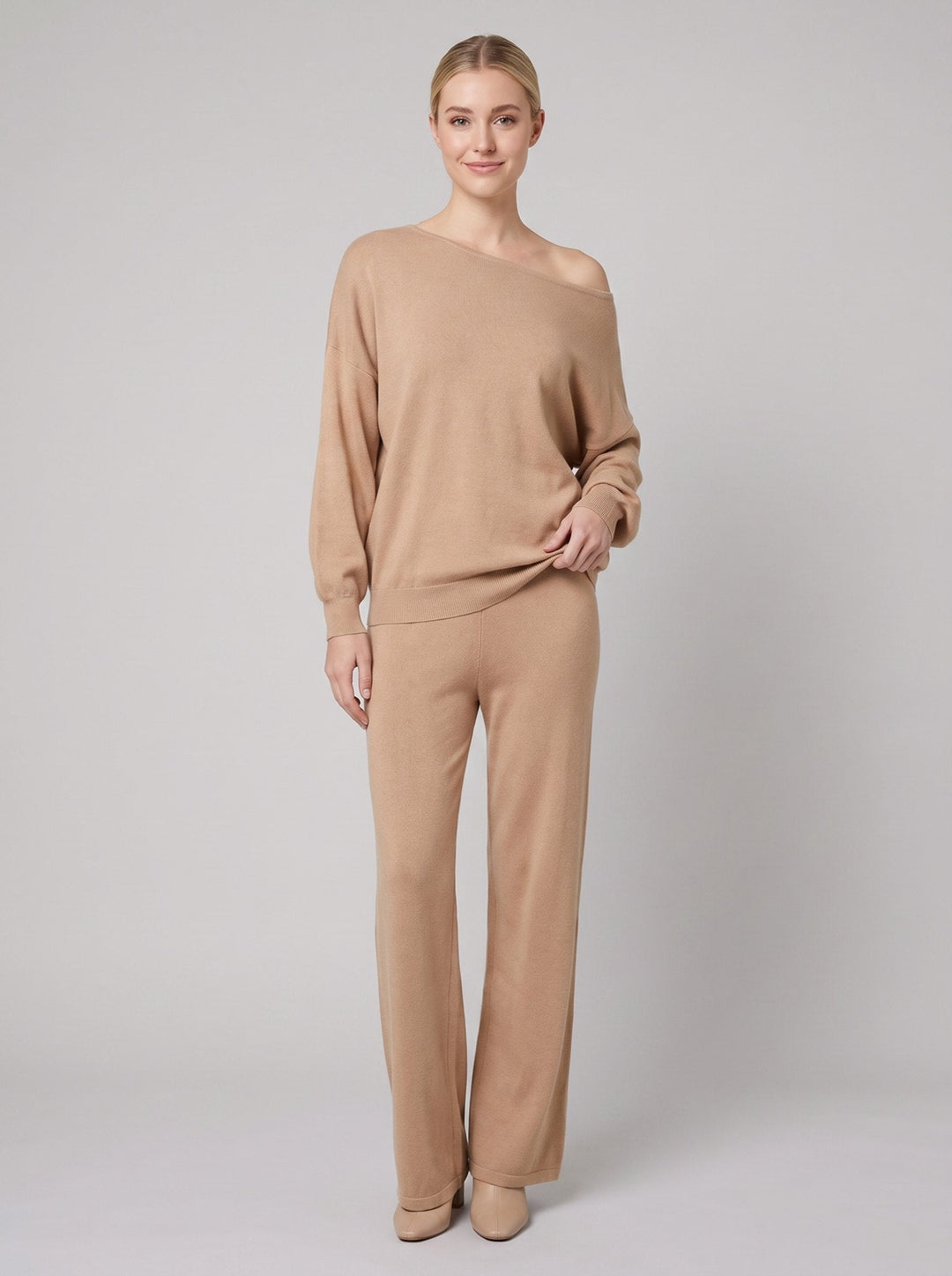 Luxe Eleganza loungewear set in khaki tan, off-shoulder knit sweater and wide-leg pants on model