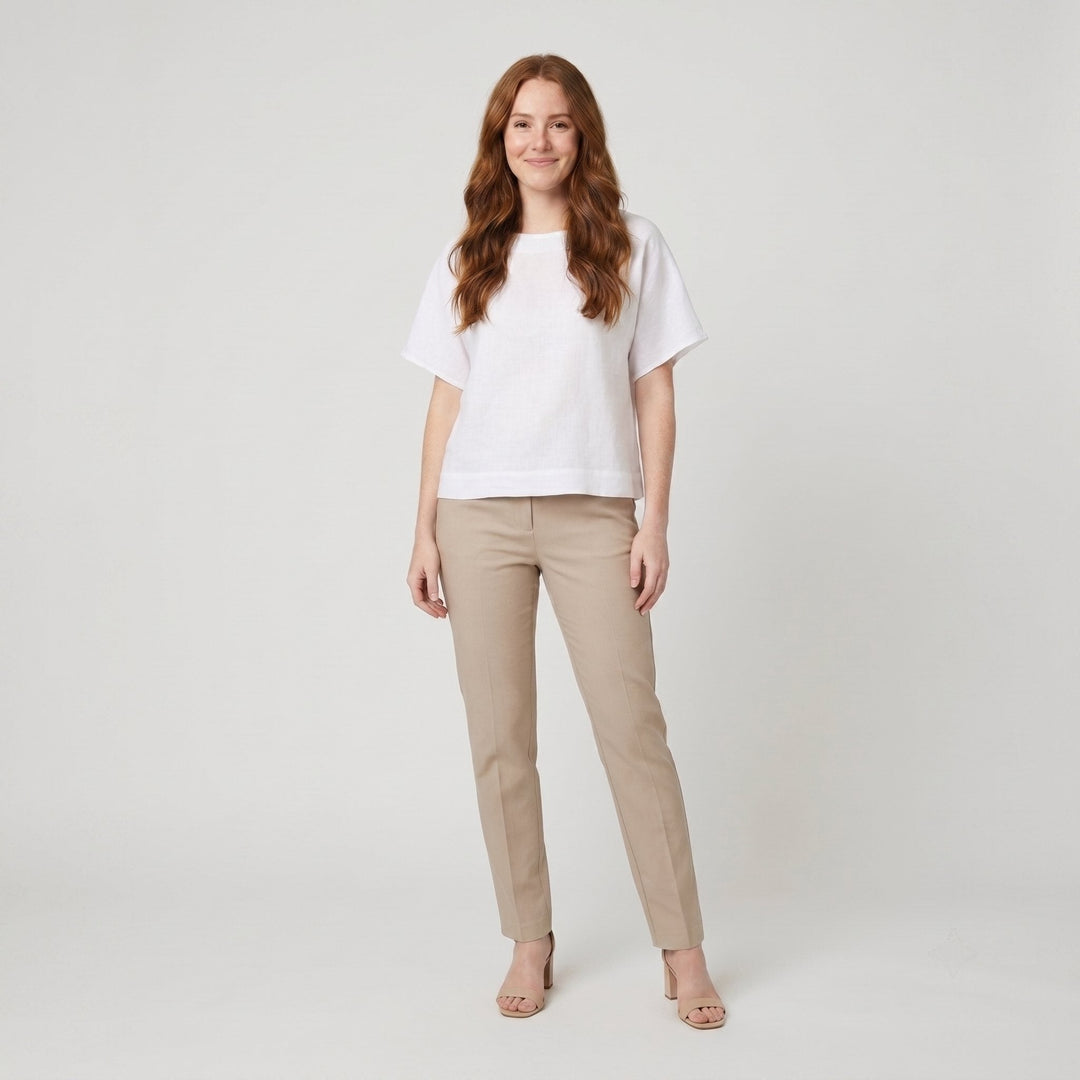Mira white loose-fit linen top front on model