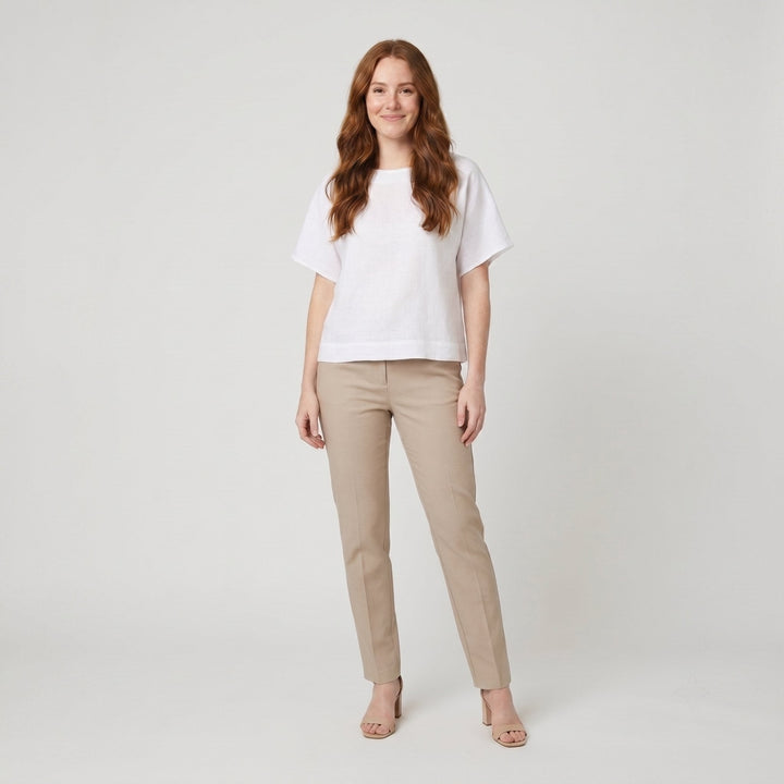 Mira white loose-fit linen top front on model