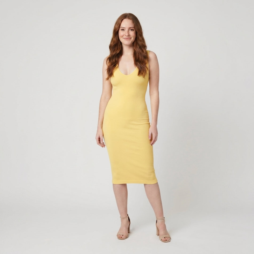 Svelte butter yellow deep V-neck ribbed bodycon midi dress on model