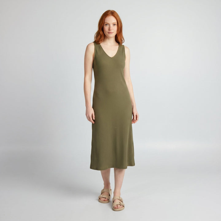 Svelte olive green deep V-neck ribbed bodycon midi dress on model